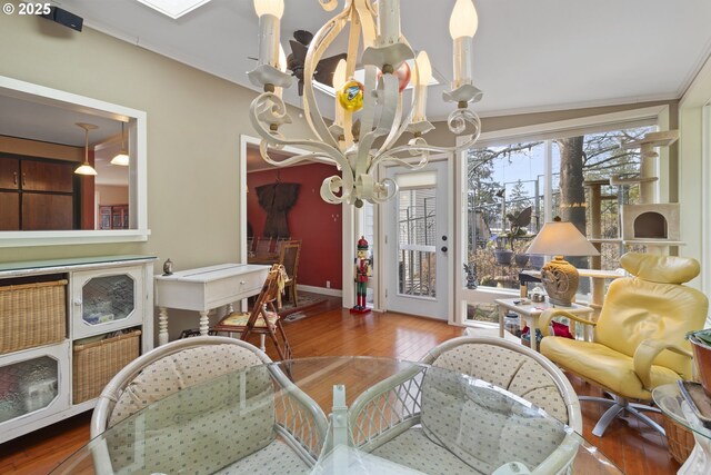 living room with a chandelier and hardwood / wood-style floors