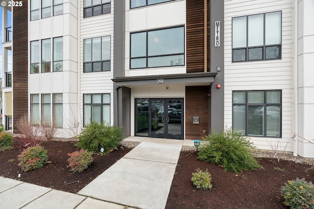 property entrance featuring french doors