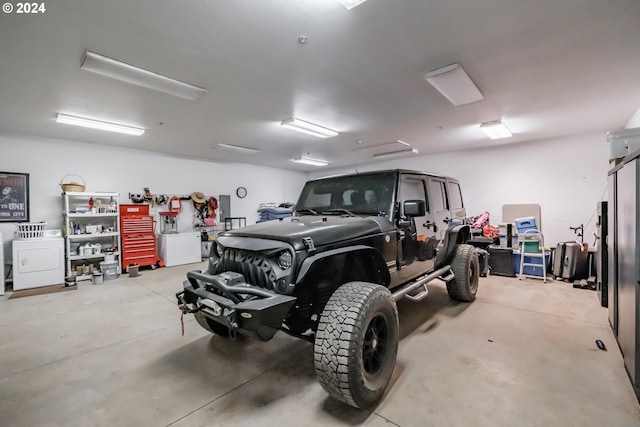 garage featuring washer / dryer