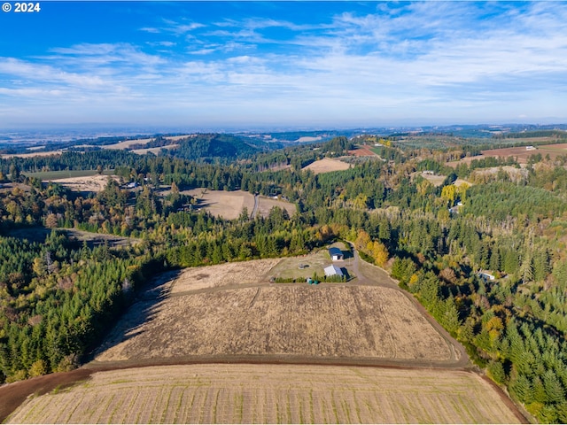 aerial view featuring a forest view