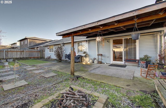 back of house with a patio