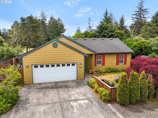1305 Sandy Ridge Rd, Gearhart, OR 97138 - view of front facade featuring a garage, concrete driveway, and a shingled roof