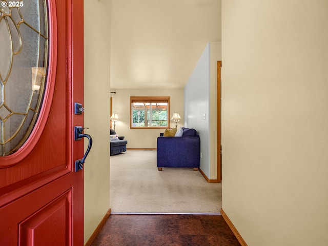 1305 Sandy Ridge Rd, Gearhart, OR 97138 - foyer entrance with baseboards and dark carpet