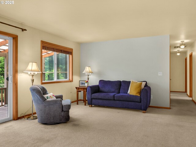 1305 Sandy Ridge Rd, Gearhart, OR 97138 - carpeted living area featuring baseboards