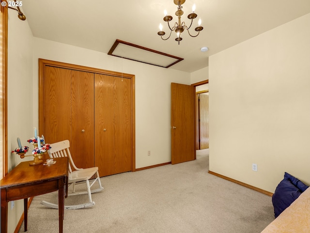 1305 Sandy Ridge Rd, Gearhart, OR 97138 - home office with light carpet, attic access, and a chandelier