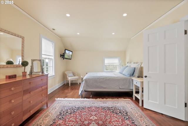 bedroom featuring lofted ceiling, baseboards, dark wood finished floors, and recessed lighting