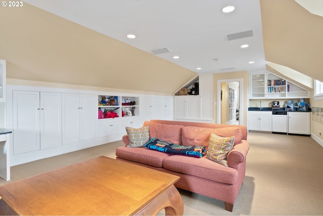 living area featuring built in shelves, lofted ceiling, recessed lighting, light colored carpet, and visible vents