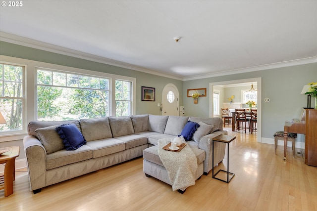 3034 NE Tillamook St, Portland, OR 97212 - living area featuring light wood-style flooring, healthy amount of natural light, and crown molding