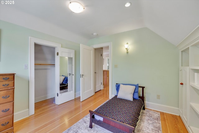 3034 NE Tillamook St, Portland, OR 97212 - living area with light wood-type flooring, french doors, and vaulted ceiling