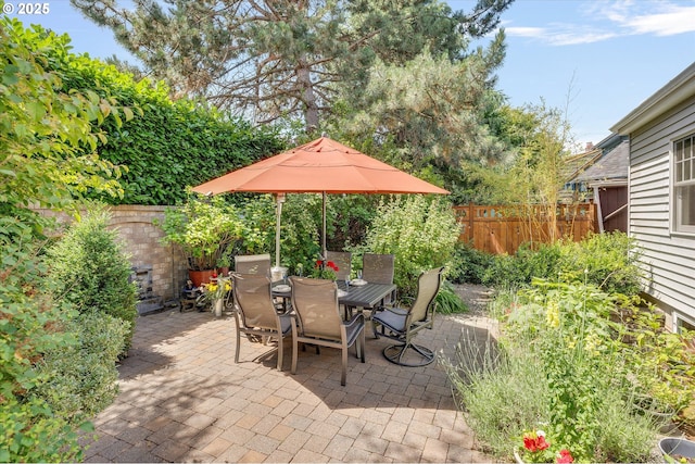 3034 NE Tillamook St, Portland, OR 97212 - fenced backyard featuring a patio area and outdoor dining space