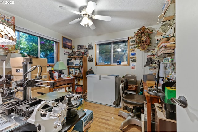 174 Cedar Ln, Gates, OR 97346 - office featuring wood finished floors, a ceiling fan, and a textured ceiling