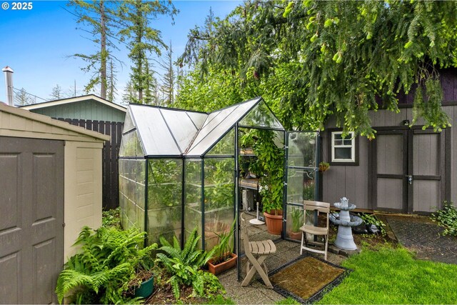 174 Cedar Ln, Gates, OR 97346 - view of greenhouse featuring a storage unit