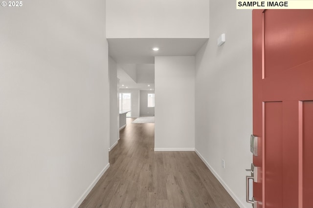 8836 SW Peia Ln, Tualatin, OR 97062 - hallway with wood finished floors, baseboards, and recessed lighting