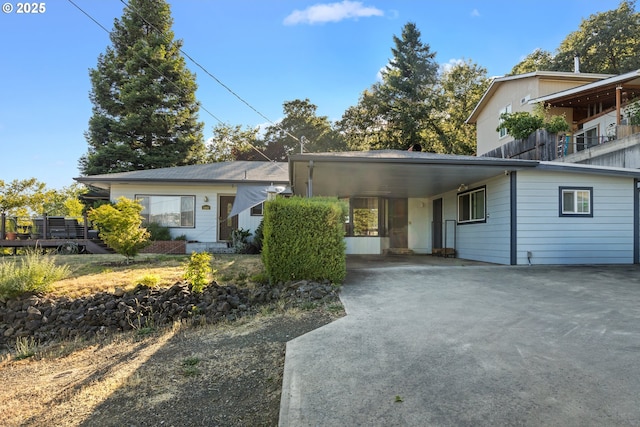 1842 NW Dogwood St, Roseburg, OR 97471 - view of front of house featuring concrete driveway and a carport