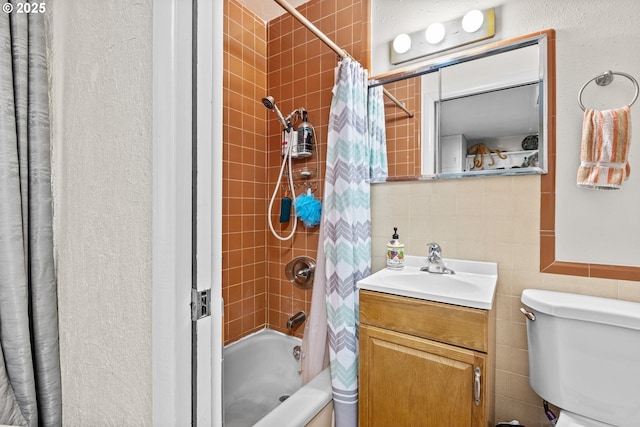 1842 NW Dogwood St, Roseburg, OR 97471 - bathroom featuring shower / bath combo, vanity, tile walls, and toilet