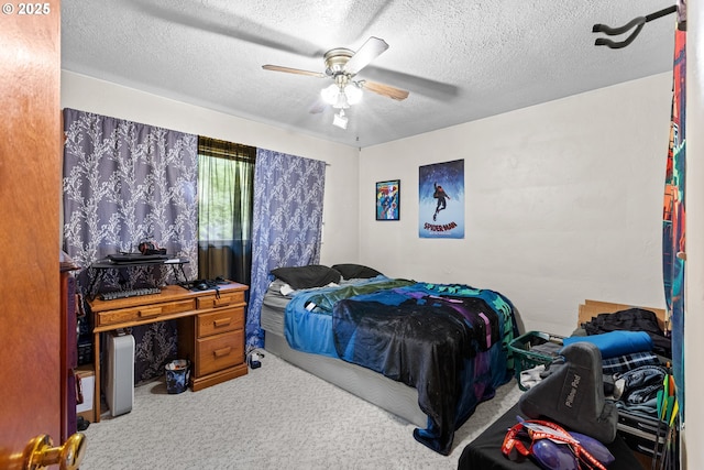 1842 NW Dogwood St, Roseburg, OR 97471 - carpeted bedroom featuring a textured ceiling and ceiling fan