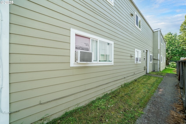 view of side of property featuring cooling unit