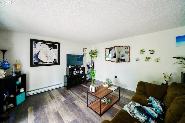 living room featuring dark hardwood / wood-style floors, a textured ceiling, and a baseboard heating unit