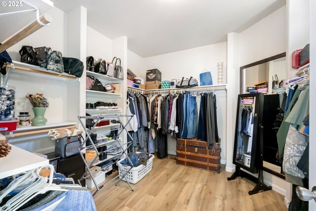 87477 Jean Dr, Bandon, OR 97411 - walk in closet featuring wood finished floors