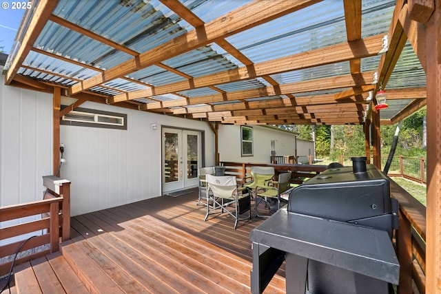 87477 Jean Dr, Bandon, OR 97411 - wooden deck featuring french doors and outdoor dining area
