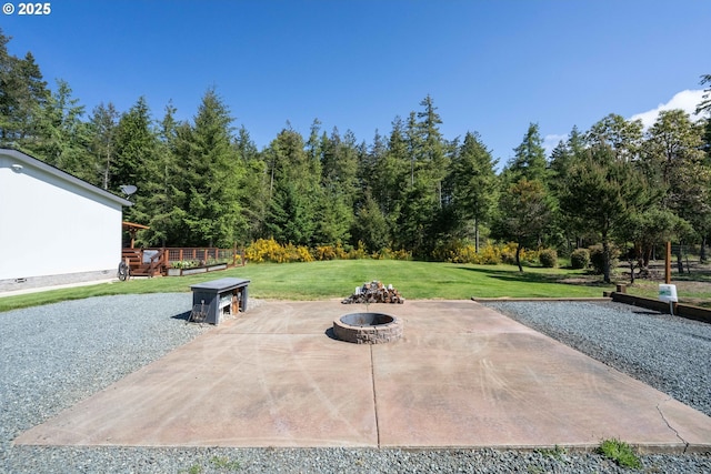 87477 Jean Dr, Bandon, OR 97411 - view of patio / terrace featuring an outdoor fire pit