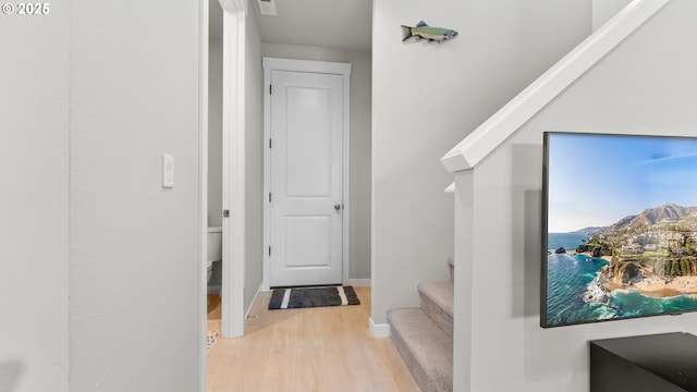 11649 SE Pleasant Valley Pkwy, Happy Valley, OR 97086 - hallway featuring wood finished floors and stairway