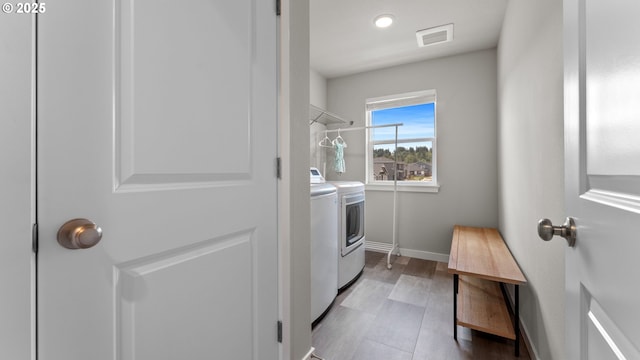 11649 SE Pleasant Valley Pkwy, Happy Valley, OR 97086 - laundry area with washer and dryer and baseboards