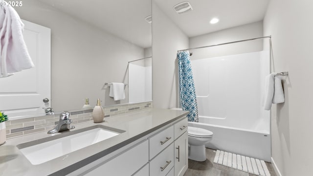 11649 SE Pleasant Valley Pkwy, Happy Valley, OR 97086 - bathroom with vanity, tasteful backsplash, shower / bath combo with shower curtain, and recessed lighting