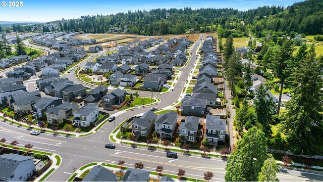 11649 SE Pleasant Valley Pkwy, Happy Valley, OR 97086 - aerial overview of property's location featuring nearby suburban area and a heavily wooded area
