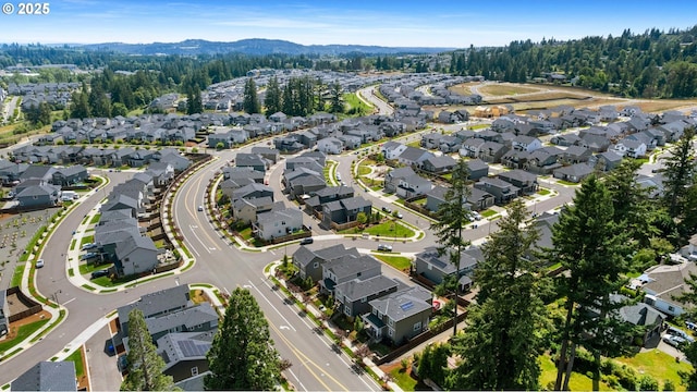 11649 SE Pleasant Valley Pkwy, Happy Valley, OR 97086 - aerial view of property and surrounding area with nearby suburban area and a mountain backdrop