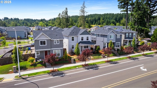 11649 SE Pleasant Valley Pkwy, Happy Valley, OR 97086 - aerial perspective of suburban area featuring a heavily wooded area