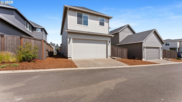 11649 SE Pleasant Valley Pkwy, Happy Valley, OR 97086 - view of front facade featuring an attached garage and driveway