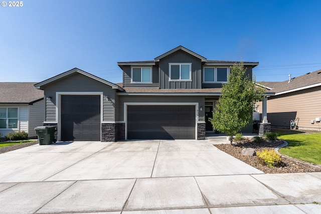 839 E Autumn Ave, Hermiston, OR 97838 - craftsman house featuring board and batten siding, stone siding, concrete driveway, and an attached garage