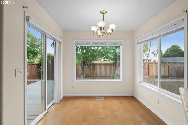 2290 N Irvine St, Cornelius, OR 97113 - unfurnished sunroom with a chandelier