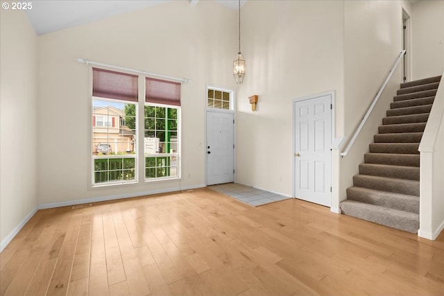 2290 N Irvine St, Cornelius, OR 97113 - foyer featuring wood finished floors, stairs, and high vaulted ceiling