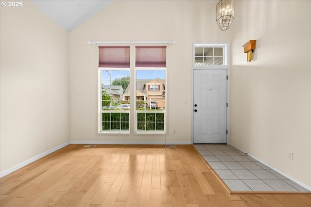 2290 N Irvine St, Cornelius, OR 97113 - entryway featuring light wood-style flooring, a chandelier, and lofted ceiling