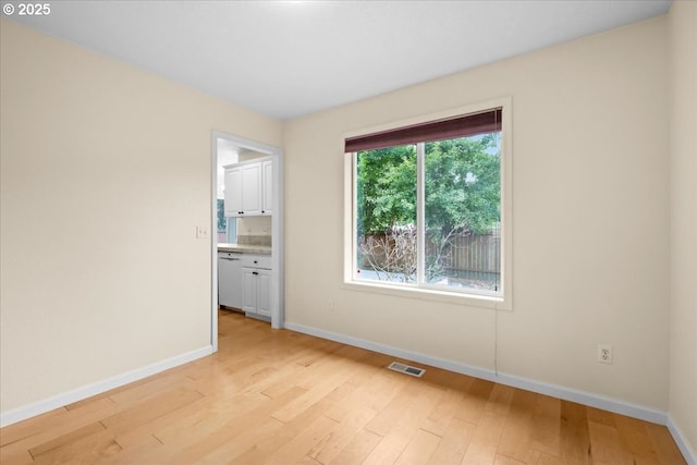 2290 N Irvine St, Cornelius, OR 97113 - spare room with baseboards and light wood-type flooring