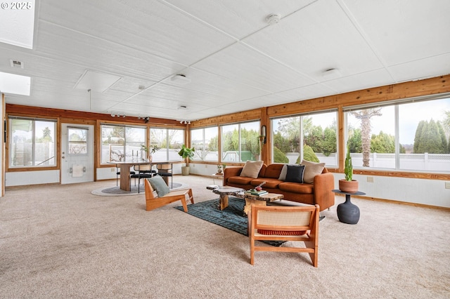 sunroom with plenty of natural light and visible vents