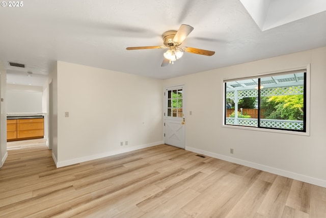 420 Mar Loop, Eugene, OR 97401 - empty room featuring light wood-style flooring, baseboards, and a ceiling fan