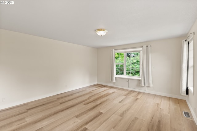 420 Mar Loop, Eugene, OR 97401 - unfurnished room with light wood-style flooring and baseboards