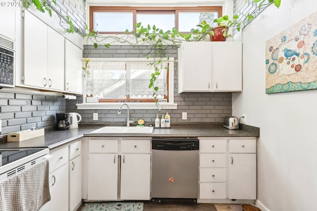 kitchen featuring decorative backsplash, dishwasher, a sink, white electric range oven, and white cabinetry