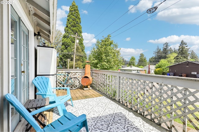 view of wooden balcony with a wooden deck