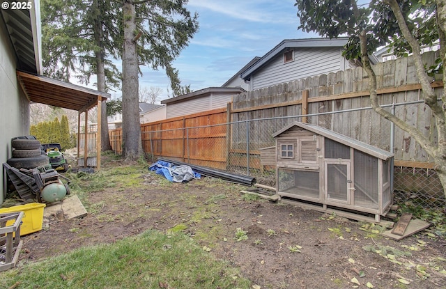 116 SE Williams Rd, Gresham, OR 97080 - fenced backyard featuring exterior structure and an outdoor structure