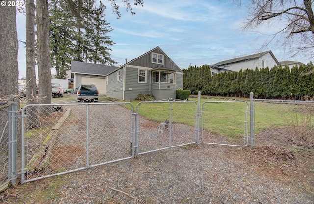 116 SE Williams Rd, Gresham, OR 97080 - bungalow featuring board and batten siding, a gate, and dirt driveway