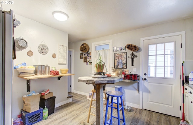 116 SE Williams Rd, Gresham, OR 97080 - dining area with wood finished floors and a textured ceiling