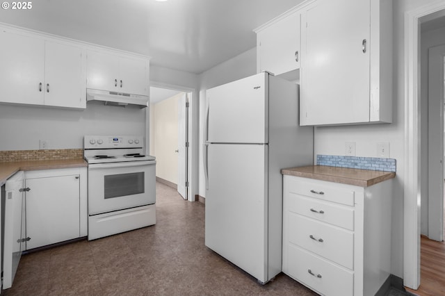 kitchen featuring white appliances and white cabinets