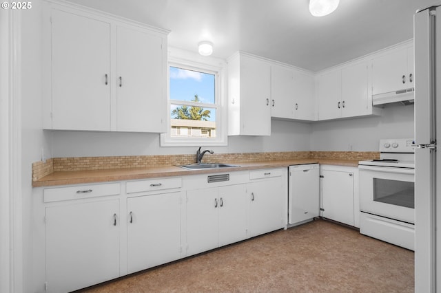 kitchen with white cabinetry, sink, and white appliances