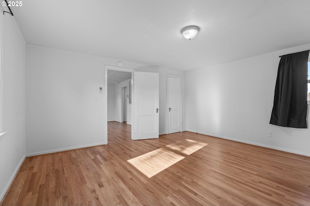 empty room featuring light wood-type flooring