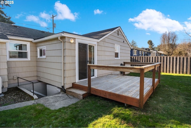 wooden terrace with a yard