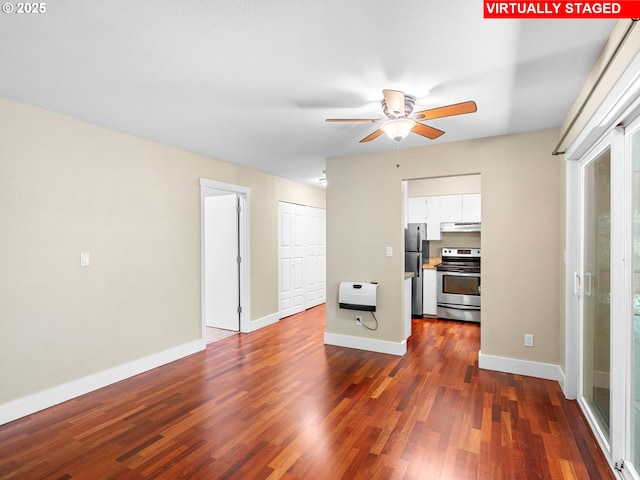 6801 SW Terri Ct Unit 60, Portland, OR 97225 - unfurnished living room with ceiling fan, dark wood-style flooring, and heating unit